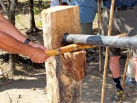 Using a sugar cane press to squeeze out the juice