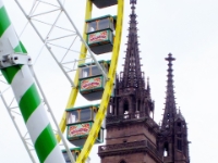 Ferris wheel next to Basel Minster