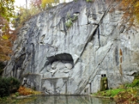 The monument of a dying lion carved in a rock face in 1972 & dedicated to Tuileries war heroes.